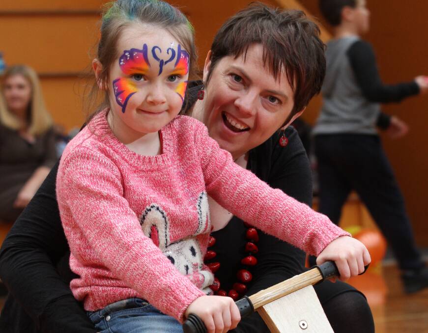 Manager of the Autism Specific Early Learning and Care Centre Kathryn Fordyce with 5-year-old Zoe Slater of Penguin. Picture: Jason Hollister