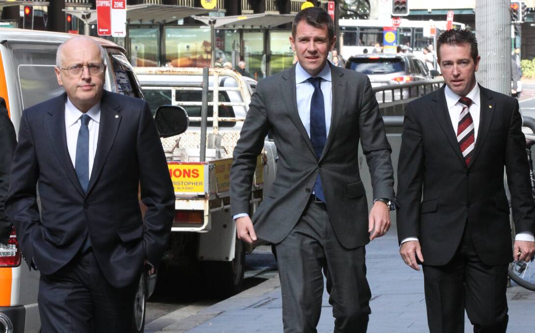 MERGERS IN MIND: Premier Mike Baird, centre, and Local Government Minister Paul Toole, right. 