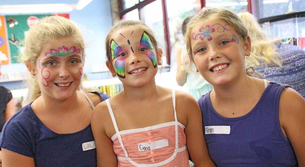 Together!Day at Forster: Lilli, Ciana and Rhani Bultitude enjoying craft and face painting. Pic: supplied