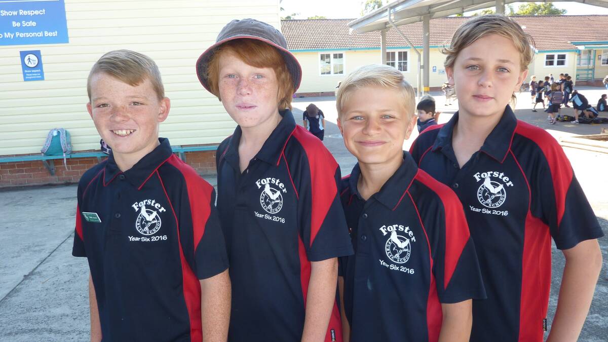 Year 6 Boys, Taine Black, Tom Kennedy, Will Lumley, Nathan Koutts, proudly displaying their new Year 6 shirts with a red panel of colour added to the shirt.