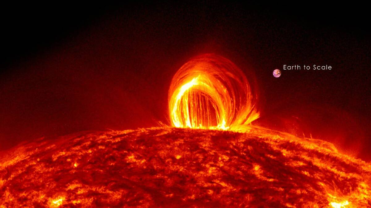 Solar flares like this recent one are dozens of times the size of the Earth. Photo from NASA.
