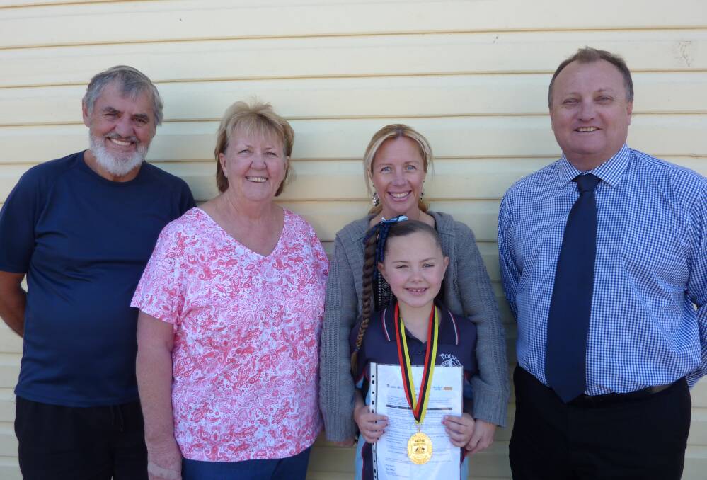 Proud family members, grandparents Peter and Pamela Summers and mum Carol Summers, and school principal, Rick Clissold congratulate Jasmine on her prestigious award.