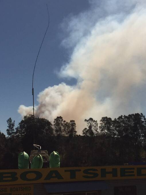 Smoke from the Nabiac bush fire billows into the sky,  taken from Wallis Lake, Forster.