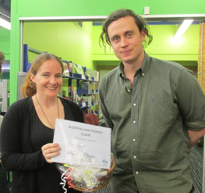 People's Choice award winner Nikki Heavey with host Phil Wilcox at the Kempsey Shire Library for the Australian Poetry Slam heat.