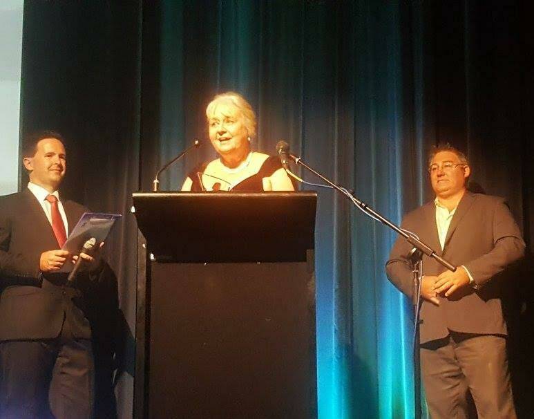 Top award: Director of Milligans Debra Atkins accepts the award for Business of the Year at the MidCoast Business Awards. 