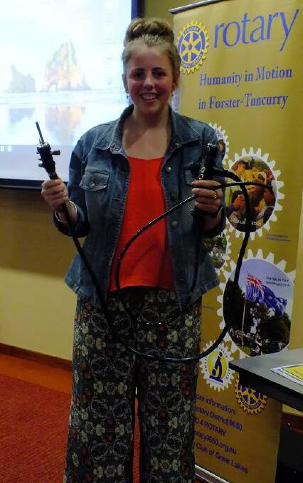 Sarah Ward gave a presentation on nano-technology at the Rotary Club of Great Lakes. The 16-year-old St Clare's High School student holds an endoscope. 