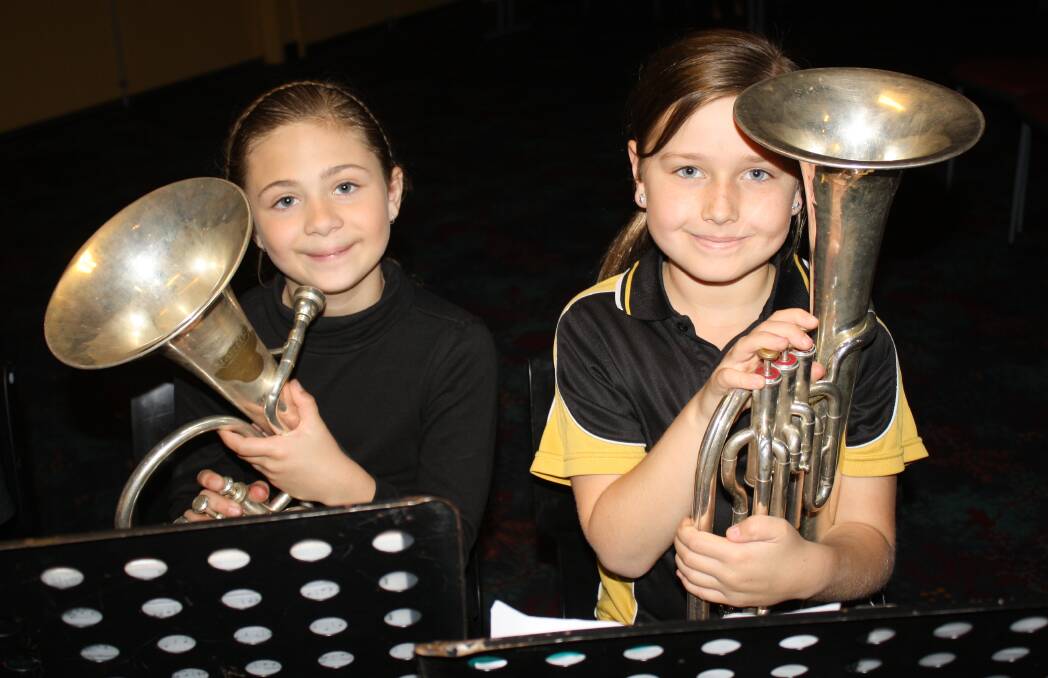Tuncurry Public School students Laney Boyd and Jessika Jordan at Shine On in 2014.
