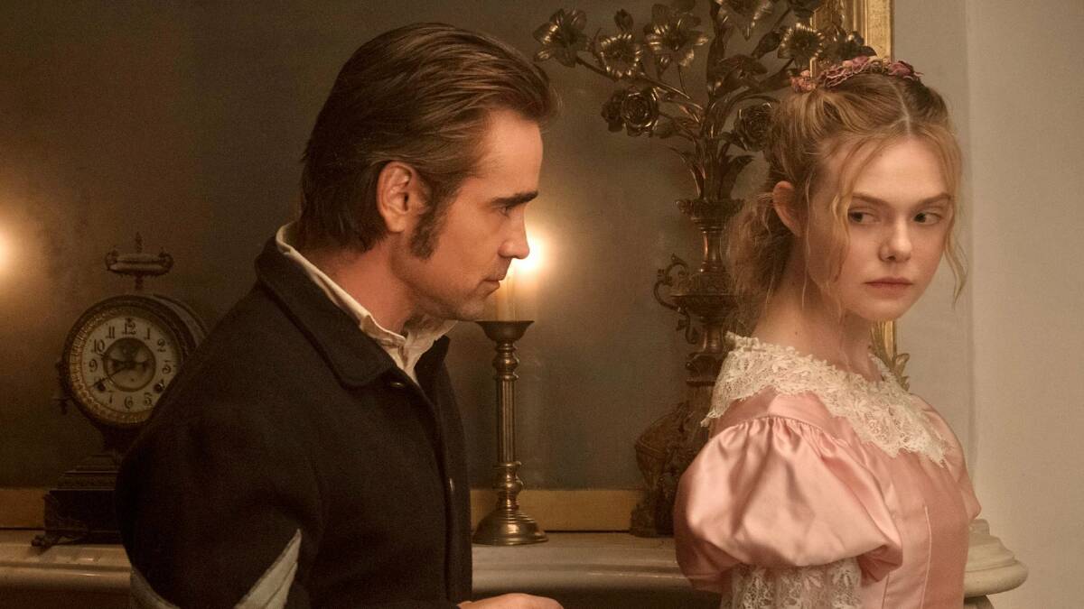 Temptation: Alicia (Elle Fanning), beautiful and longing for sexual adventure, walks into deserter McBurney's (Colin Farrell) room and kisses him on the lips in The Beguiled.