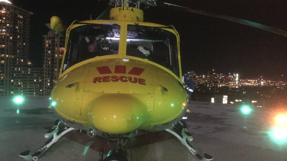 The rescue helicopter on the pad at Royal North Shore after flying the 25-year-old rugby league player down from Tuncurry. 