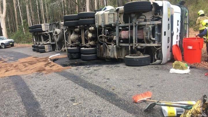 A truck rolled on Rollands Plains Road. Photo: Sancrox-Thrumster Rural Fire Brigade