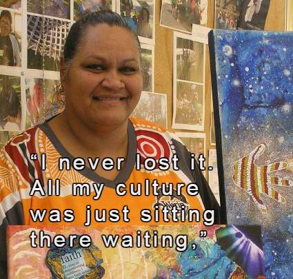 Verqelle Fisher with some of her creations at TAFE, where an Aboriginal art class led to an exhibition at the Glasshouse.  Click the photo to read the full story
