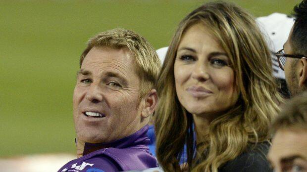 Shane Warne with Elizabeth Hurley during a cricket promotional tour in Los Angeles in November 2014. Photo: Getty Images