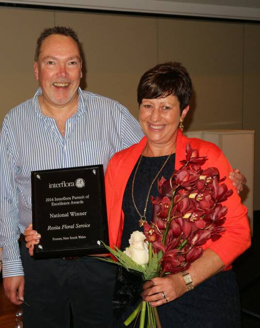Interflora's John Barclay and Rosita Florist's Denise Lauff with the national Pursuit of Excellence award.