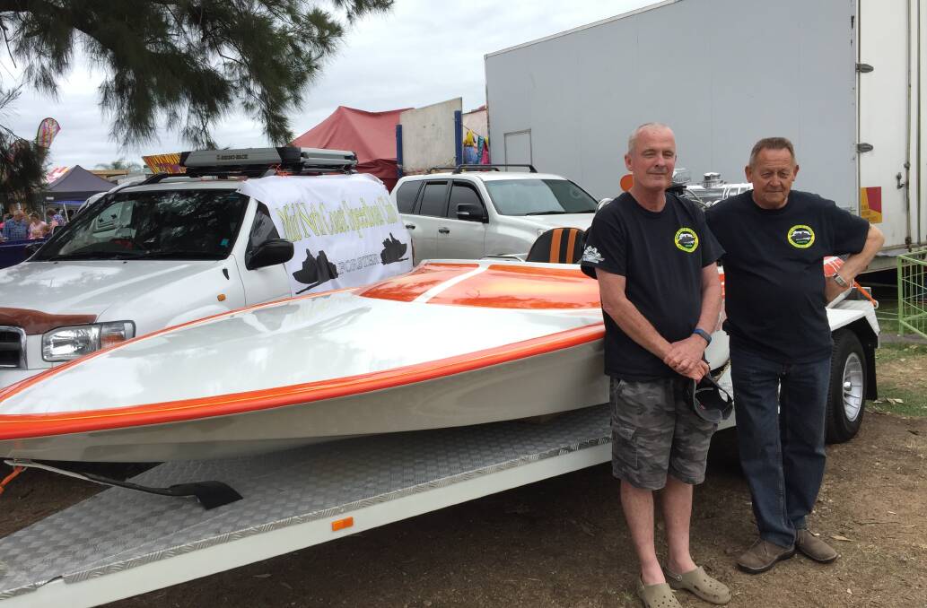 Ross Cupitt and Steve Pascoe with Steve's 37 year old speed boat Outcast.