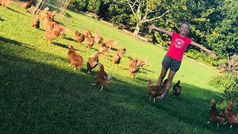 Stevie with her rescue hens.