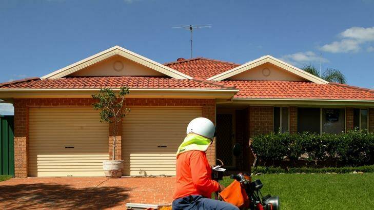 Home owners with an average mortgage will be paying about $5 less each month.  Photo: Louise Kennerley