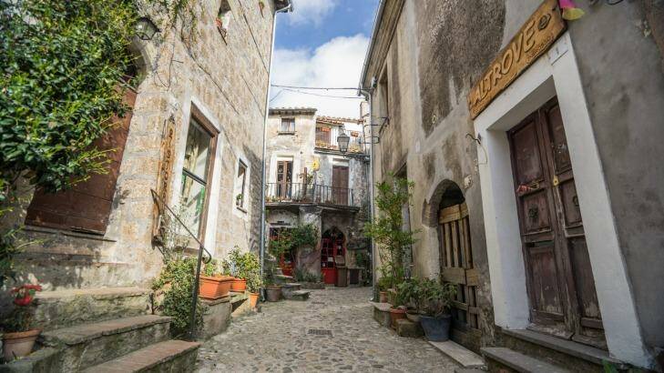 Calcata is a rabbit warren of cobbled streets, with tiny stone houses piled one on top of the other.