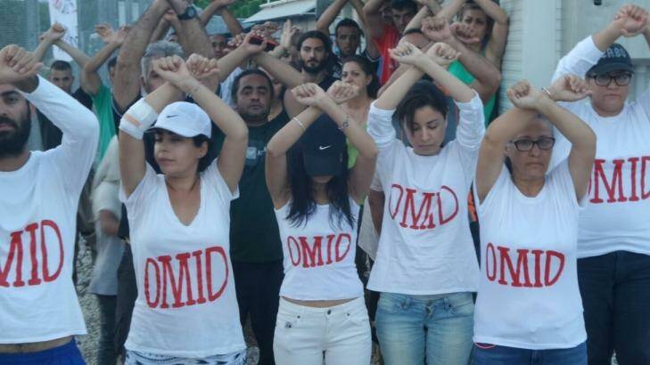 Refugees on Nauru wear T-shirts with Omid's name as a show of solidarity.
