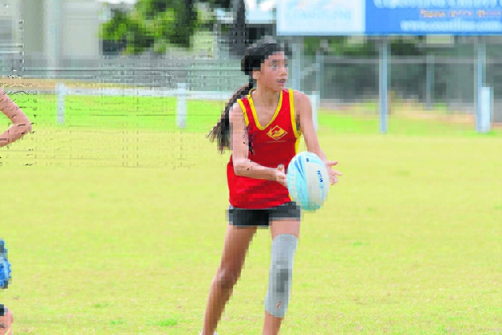 Mona Walker fires out a pass for Hallidays Point in a State PSSA touch game. She's been named in the NSW side to play in the Pacific Games in Adelaide in November.