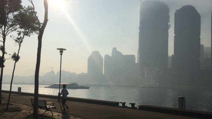 Smoke settles over the city skyline due to fire hazard reduction operations in the Blue Mountains.  Photo: Andrew Darby