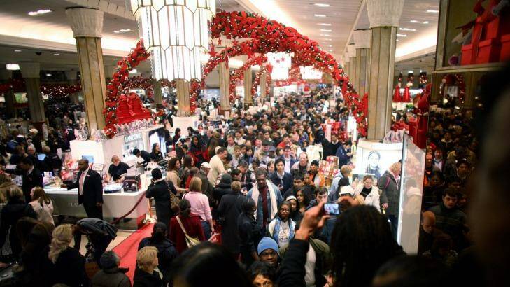 Black Friday masses: A crowd of shoppers hunt for bargains at Macy's  Photo: Yana Paskova