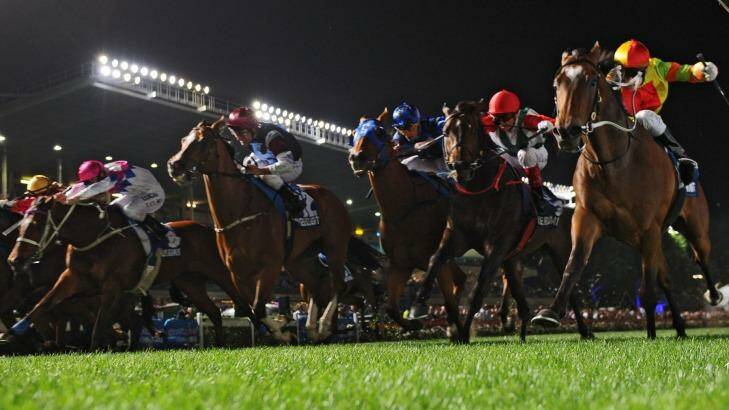 Exciting finish: Lankan Rupee (right) just holds off rivals in a classic end to the Manikato Stakes on Friday night. Photo: Vince Caligiuri/Getty Images