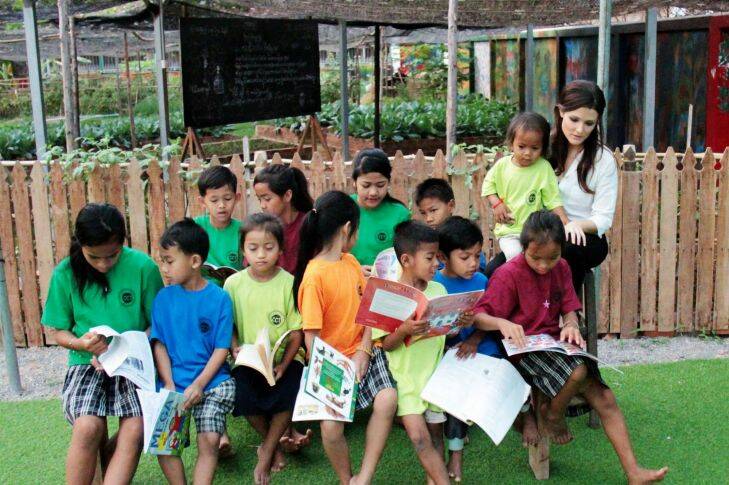 Australian Tara Winkler from the Cambodian Children??????s Trust with students in Cambodia. Ms Winkler campaigns to stop so-called ??????orphan tourism.??????