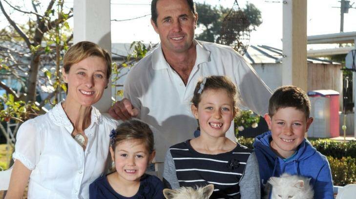 Geoff and Kim Hunt with their children Phoebe (left), Mia and Fletcher Photo: Les Smith