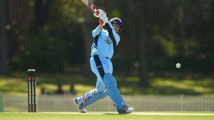 Lashing out: Nic Maddinson bats for New South Wales against the Cricket Australia XI at Bankstown Oval. Photo: Mark Kolbe