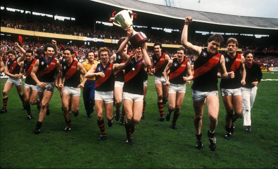 Essendon players delight in their win after being 23 points down at three-quarter-time. Fairfax images.