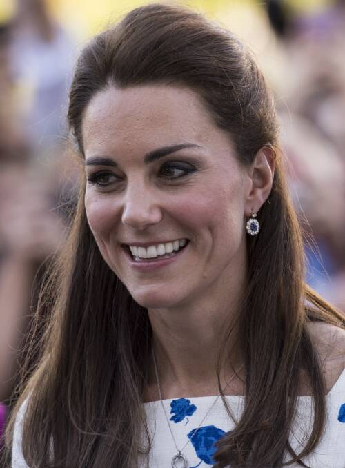 Catherine, Duchess of Cambridge meets well wishers during a walkabout on April 19, 2014 in Brisbane, Australia. The Duke and Duchess of Cambridge are on a three-week tour of Australia and New Zeal on April 19, 2014 in Brisbane, Australia. Photo: Arthur Edwards - Pool/Getty Images.