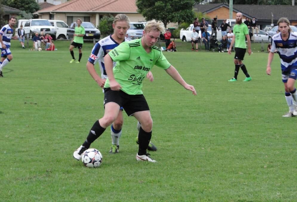 TOUGH OPPONENTS: Wallis Lake central midfield player Ryan Folkes in action against the Macleay Valley Rangers earlier this year. The local side have a tough game ahead when they take on the Rangers in Kempsey this weekend.  
