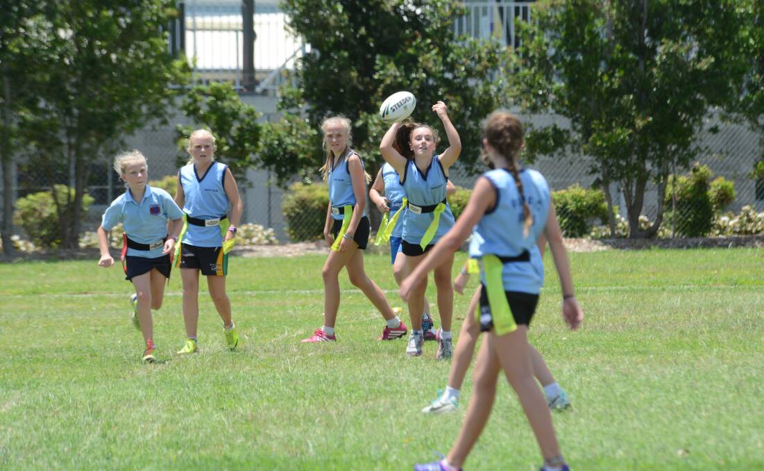 LINING IT UP: Miranda Andrews (throwing the ball) from Pacific Palms during last week’s primary school league tag gala day in Taree.  