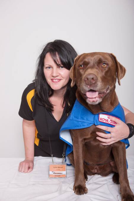 SUPPORT CAMPAIGN: Petbarn Forster store manager Lyndsay Heaton and a seeing eye dog. Petbarn and Seeing Eye Dogs Australia are calling on local residents to donate funds to help train the dogs so they can assist people who are blind or have low vision.   
