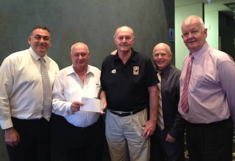 CLUB PROCEEDS SHARED: Dave Marsh, Paul Norris, Brian Atherton, Terry Green, Chris Turner at the cheque presentation. 