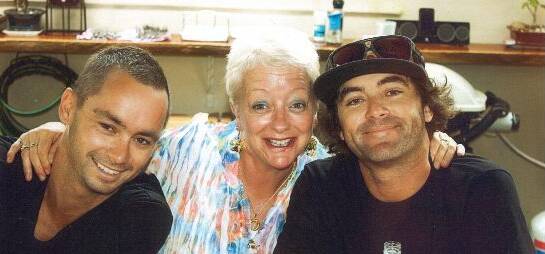 CLOSE FAMILY: Toby (far left) with his mother Theresa and brother Michael. 