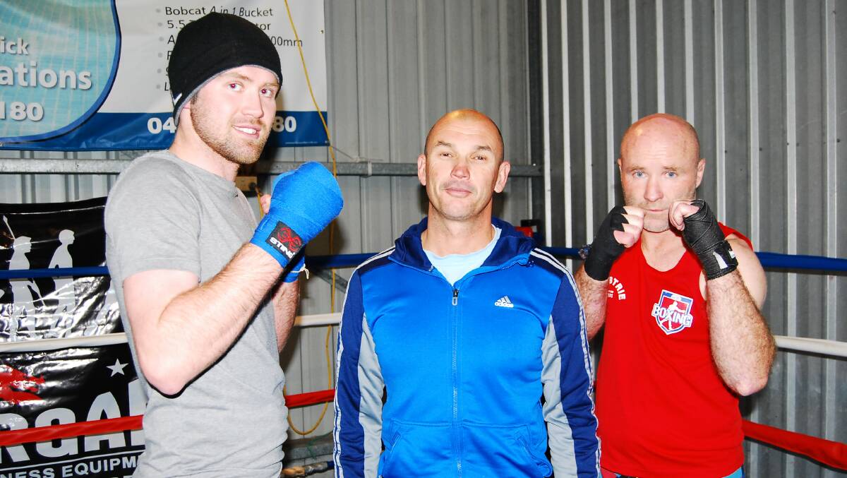 EXPERIENCED: Father and son boxers, Adam (left) and Darren Fitzsimmons (right) from Old Bar have been training hard with Paul Cheers. 