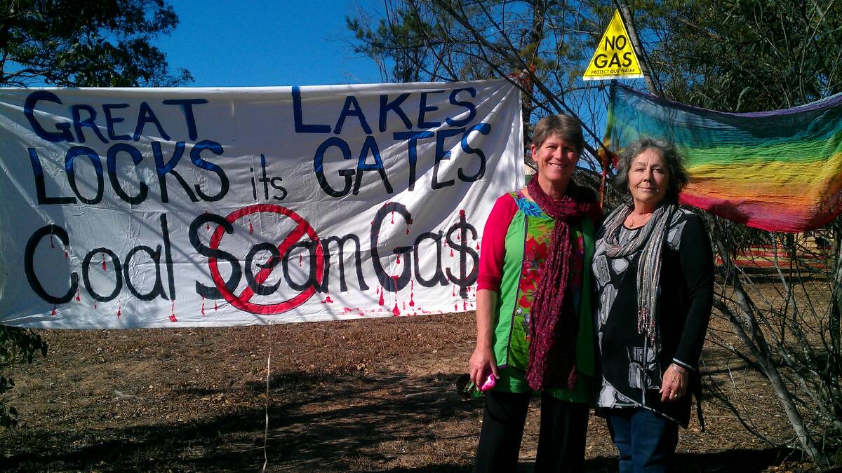 JOINED THEM: Ex-Gloucester Councillor Julie Lyford and Great Lakes Councillor Linda Gill protest outside the AGL office in Gloucester. 
