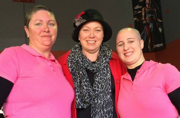 AFTER THE SHAVE: Gillian Williams and Sarah Riddell recently shaved their heads in support of Megan McArthur (centre) and for breast cancer research.   