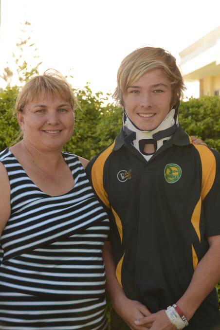 RECOGNISED: Christina Whitbread has been nominated for a National Teacher of the Year NRL One Community award for her work within the community and for assisting Curtis Landers (pictured with her at right) on the field after he suffered a serious neck injury in Port Macquarie during a football game.   
