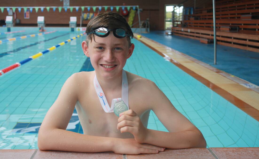 RECORD BREAKER: Forster’s Dane Jeffery, 12, received a silver medal at the NSW State Age Short Course meet in Sydney recently.  Photo by Lauren White. 
