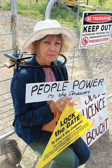 Sharyn Munro, aged 66,  is secured to an AGL gate in GLoucester by her neck with a metal D-shape lock. 
