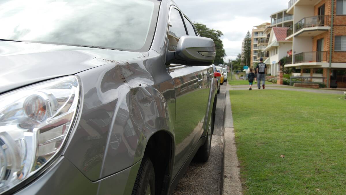 DAMAGED: Tourists and residents are counting the cost of a senseless attack on vehicles on North Street last night. 