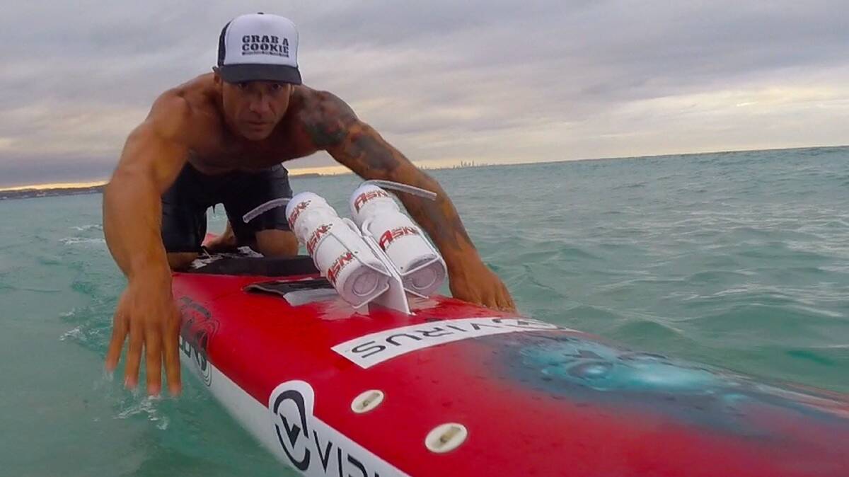 RIDING THE WAVES: Damien Rider is paddling his way to raising greater awareness of child abuse.  He plans to be in Forster on the afternoon of January 12.