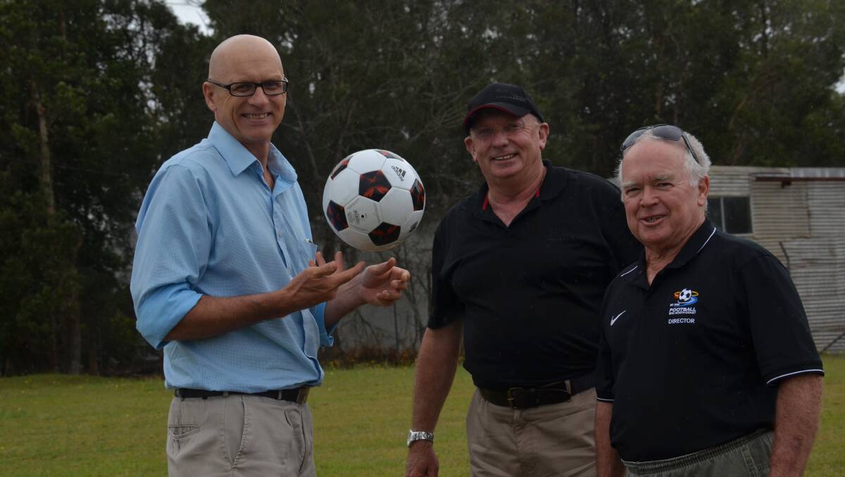 NEW ROLE: Former Fairfax journalist Peter Daniels will start his new role as the general manager of Football Mid-North Coast in January. He is pictured with Mike Parsons and the Chairman of Football Mid-North Coast Graham Pilkie. 