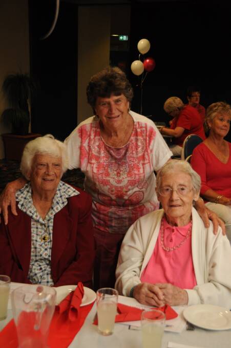 TOASTING A MILESTONE: Marie McLean, Doreen Ovens and Peg Murdoch.