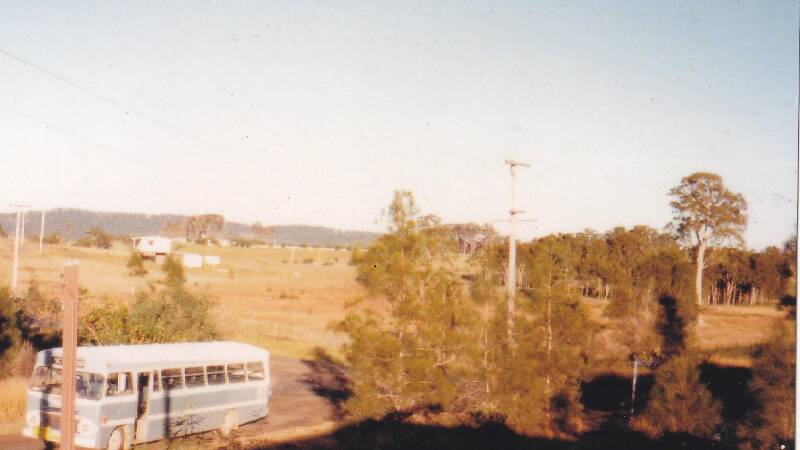 ROUNDING UP STUDENTS: The first school bus makes its rounds of Coomba Park in 1981. 