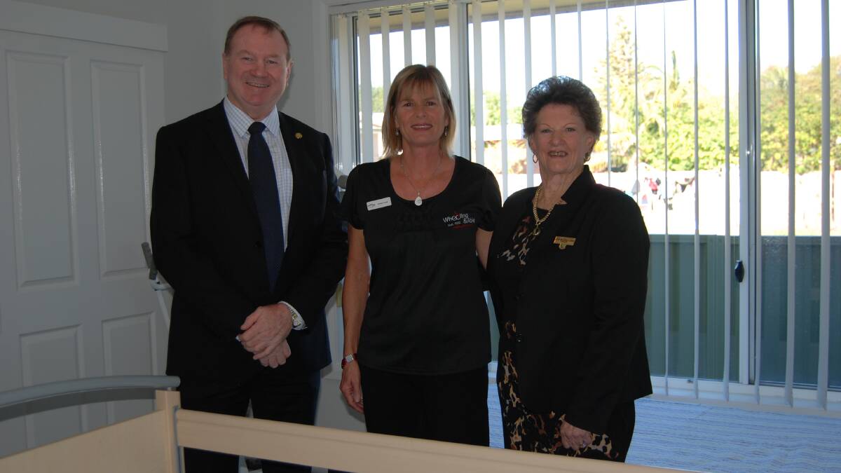 TOUR: Willing and Able’s Monique Cooper (centre) takes Member for Myall Lakes Stephen Bromhead and Great Lakes mayor Jan McWilliams through the new unit. 