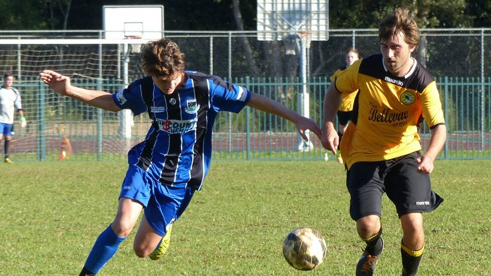 TIGERS PLAY IN PORT: Cale McCarthy defended well for the reserves.