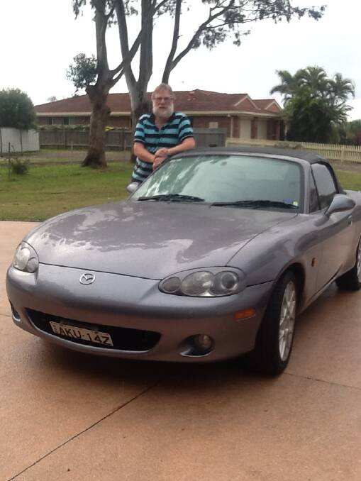 VARIED TASTE IN CARS: Denis Burns of Forster with his MX5. 